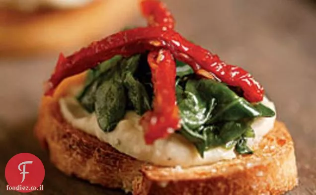 קרוסטיני עם פורי שעועית לבנה, תרד ועגבניות מיובשות