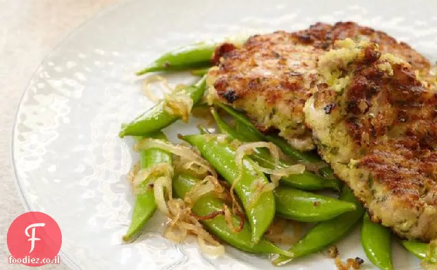 ירכיים עוף עם פירורי Garlicky ואפונה הצמד
